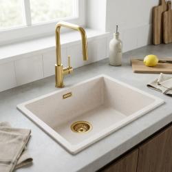 stone-kitchen-sink-with-gold-faucet